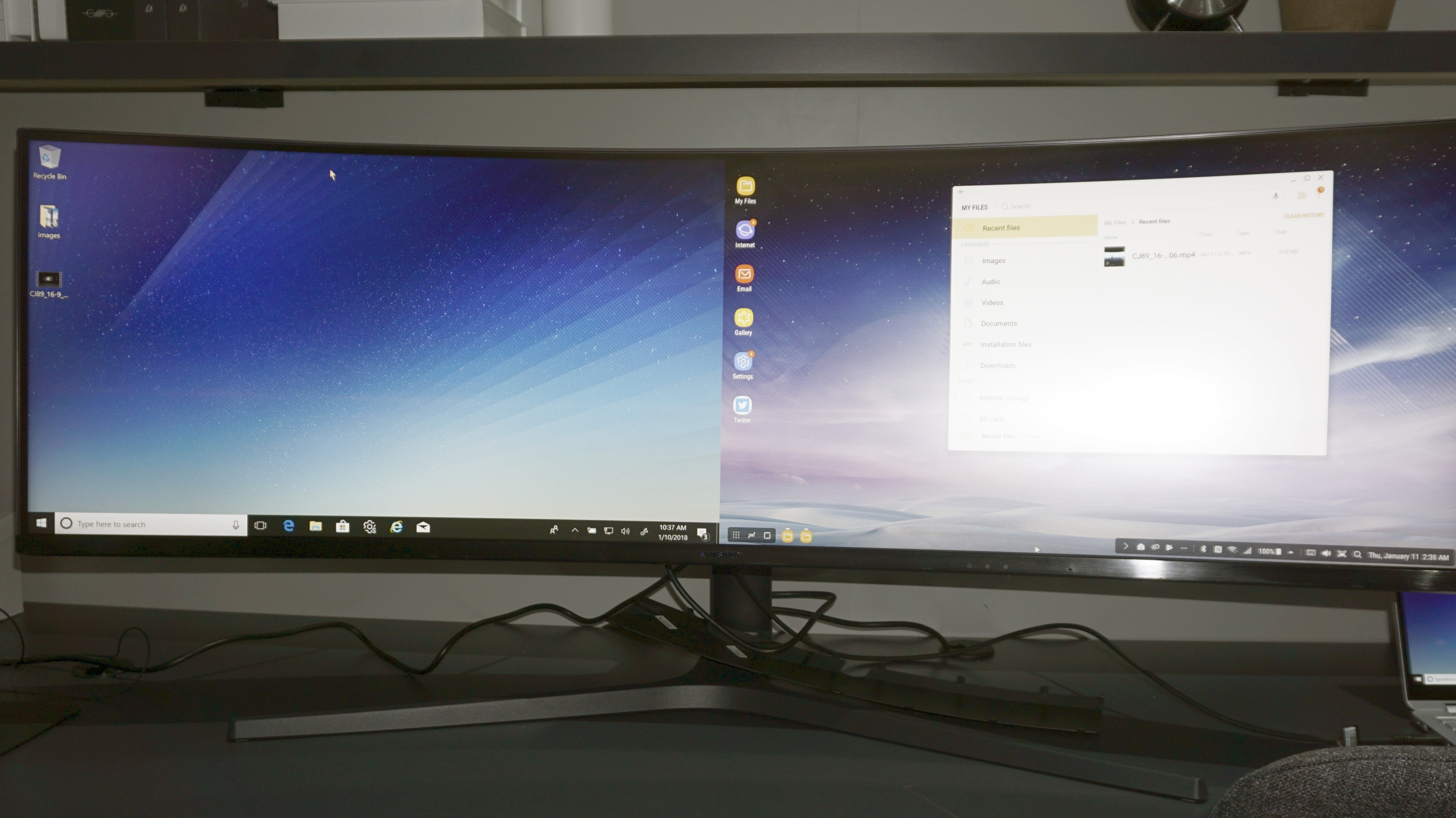 Überbreiter Büromonitor mit eingebautem Tastatur-Umschalter | heise online