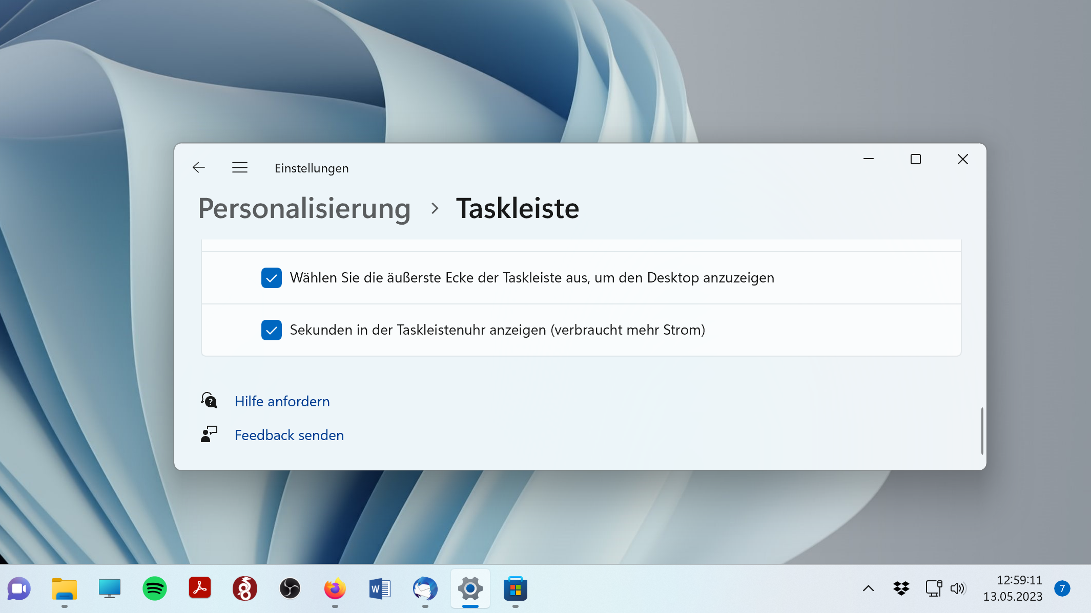 Windows-11-Update: Deutsche Live-Untertitel und Sekunden in der Taskleiste  | heise online